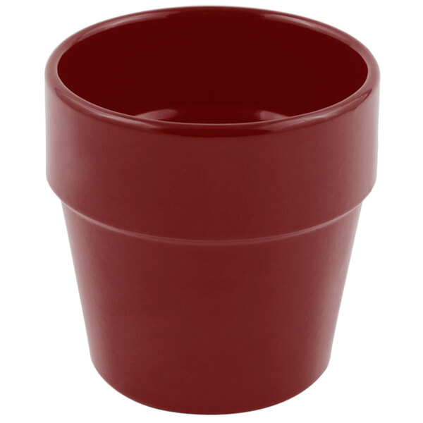 A red Bon Chef cast aluminum salad dressing pot.