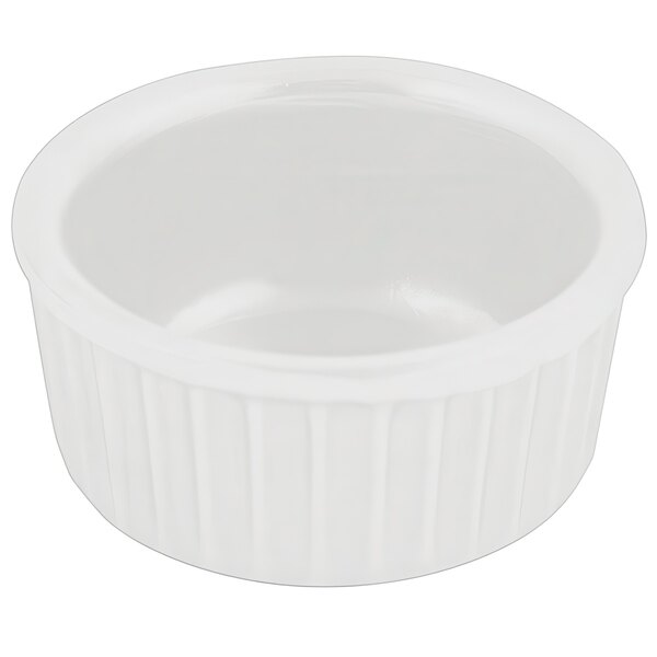 A white cast aluminum fluted ramekin with a white background.