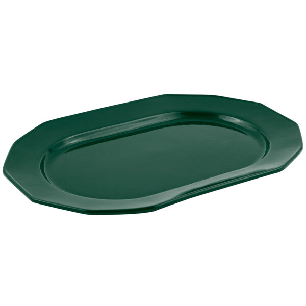 A Bon Chef hunter green cast aluminum long prism tray with a white surface.