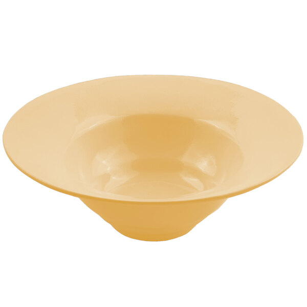 A close-up of a Bon Chef wide rim bowl with a ginger sandstone finish.