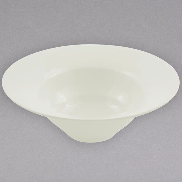 A Bon Chef ivory sandstone wide rim bowl.