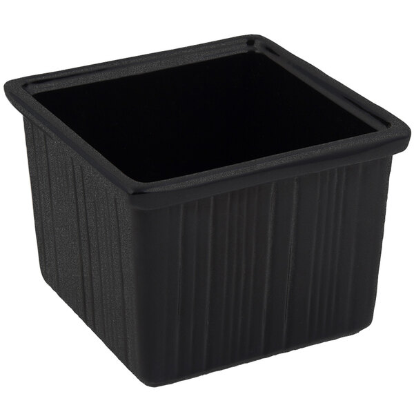 A black square Bon Chef garnish bowl with a black square top on a counter.