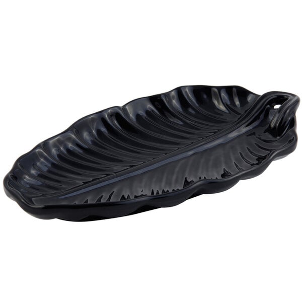 A black Bon Chef leaf platter with a handle.