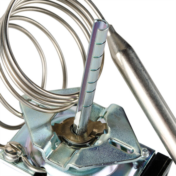 A Nemco thermostat with a metal coil.