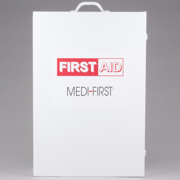 A white Medique first aid kit cabinet.