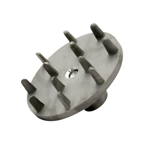 A metal drive plate with spikes and holes.