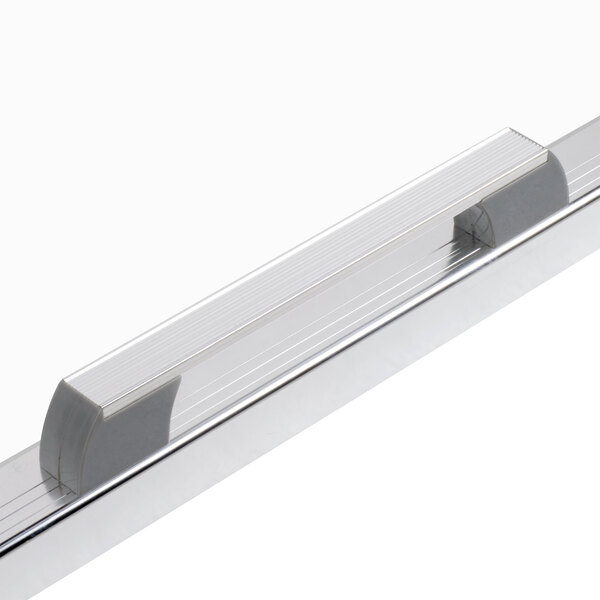 A close-up of a metal handle on a white Avantco refrigerator door.