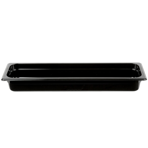 A black Rubbermaid plastic food pan on a counter.