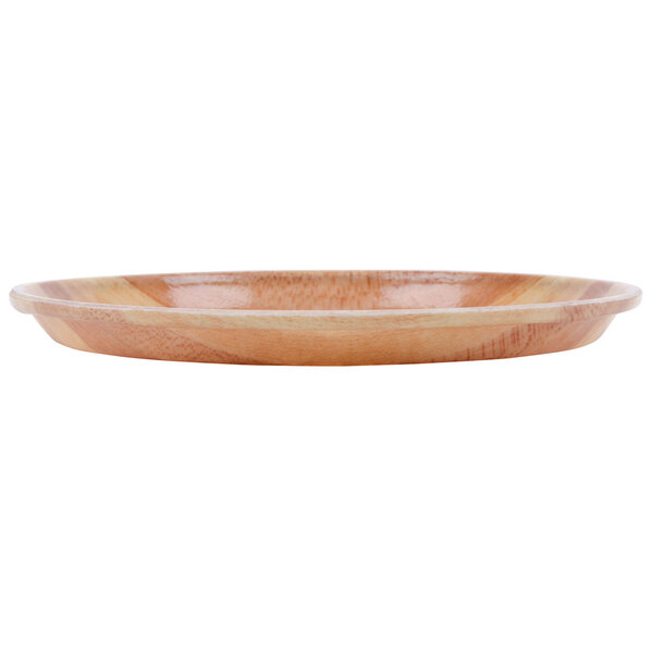 A Cambro customizable fiberglass tray with a wooden surface and brown rim.