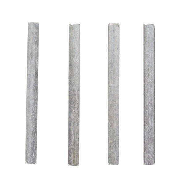 A group of four metal rods.