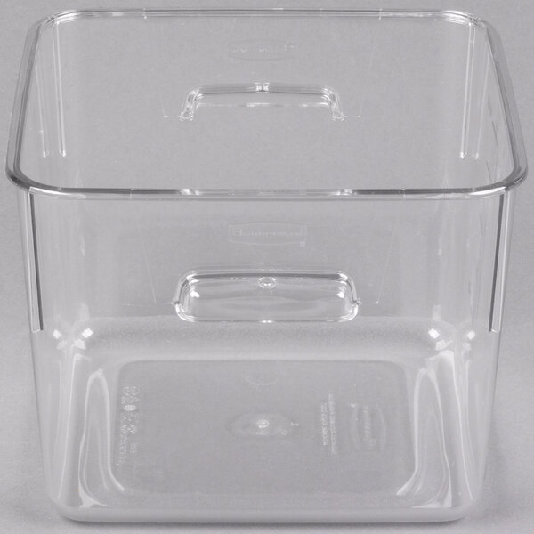 A Rubbermaid 6 Qt. clear plastic food storage container with a lid.