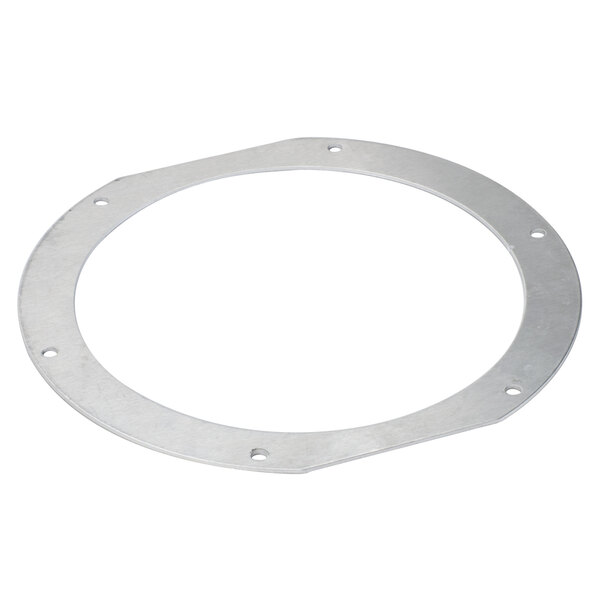 A circular metal blade retainer with holes in it.