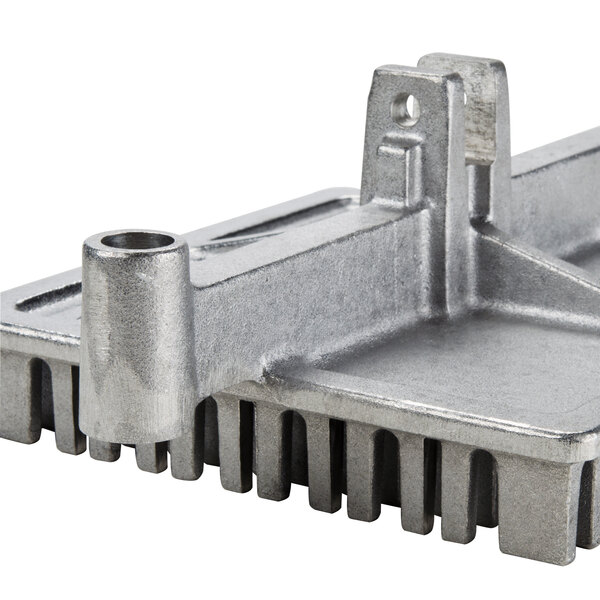 A metal square Nemco push plate.