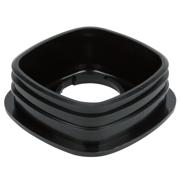 A black plastic square lid with a hole in the middle.