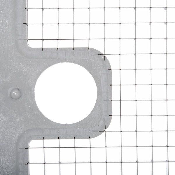 A Robot Coupe 5/16" Dicing Grid, a metal grid with holes in it.