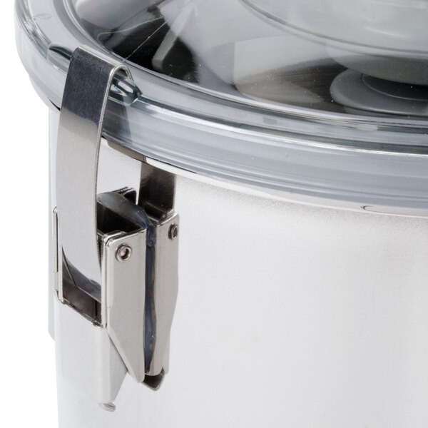 A Robot Coupe stainless steel bowl for a food processor.