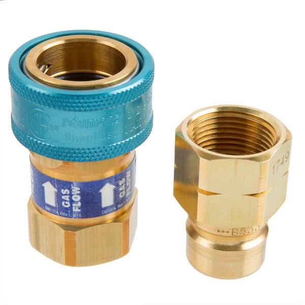 Two brass Dormont SnapFast quick disconnect fittings.