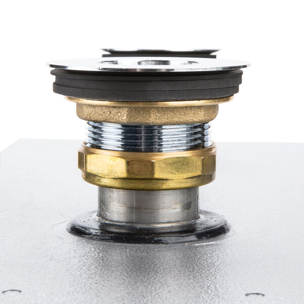 A Hatco FR-3B Food Rethermalizer with gold and brass accents on a metal table.