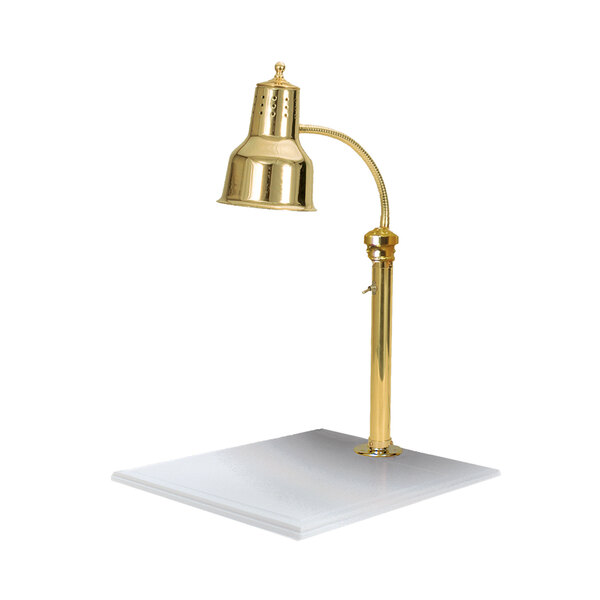 A brass Hanson Heat Lamp above a white surface.