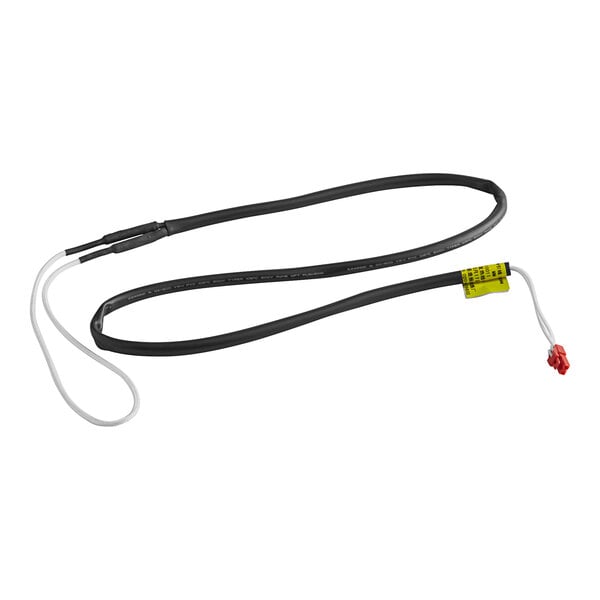 A black cable with a white background and a red connector, with a white wire and a yellow tag.