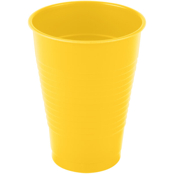 A School Bus Yellow plastic cup with a white background.