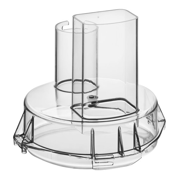 A clear plastic lid on a clear plastic food processor.