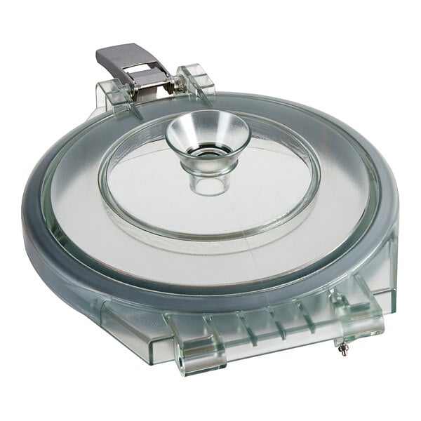 A clear circular lid with a metal handle for a Robot Coupe food processor.