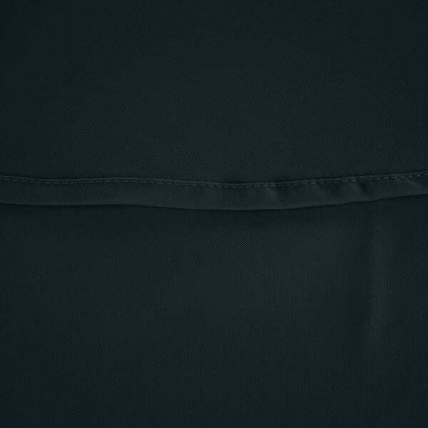 A close up of a hunter green fabric table cover.