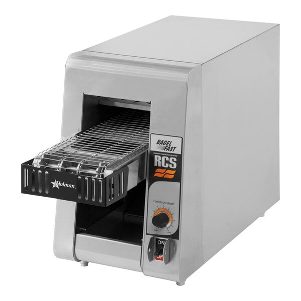 A Star Holman radiant conveyor toaster on a counter with a metal rack.