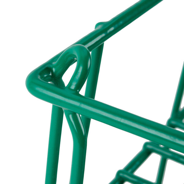 A green metal Microwire catering plate rack with a handle.