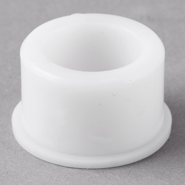 A white plastic Bar Maid equivalent upper bearing shaft.