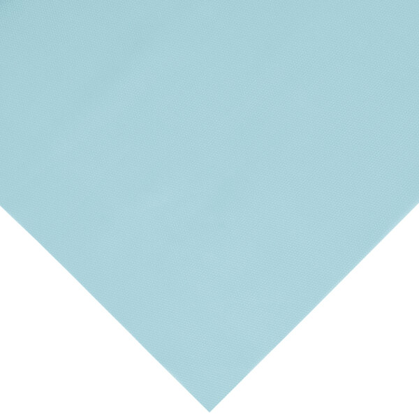 A close-up of a pastel blue plastic tablecover with a white background.