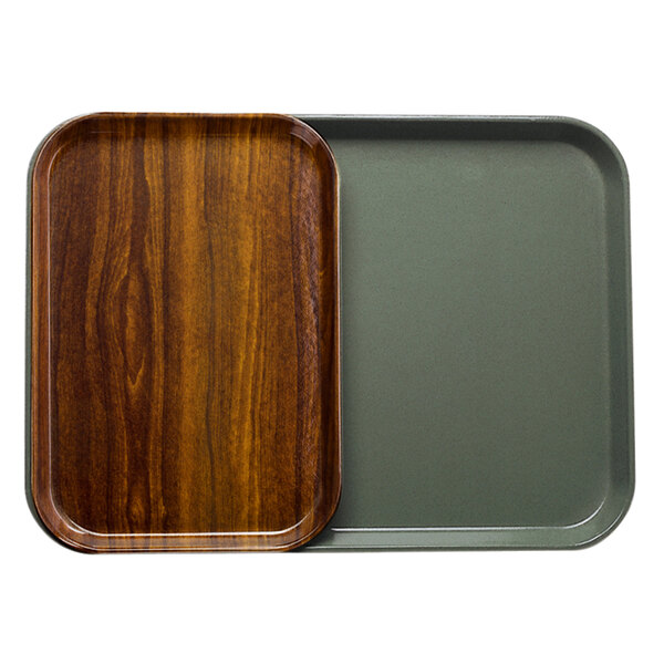 Two rectangular Cambro trays with a Burma Teak wood surface.