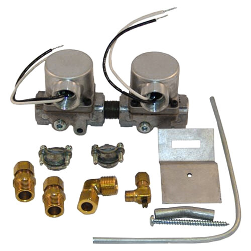 A gold metal All Points dual gas solenoid valve with a hole in the middle.