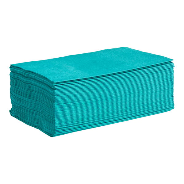 A stack of teal 2-ply paper dinner napkins.