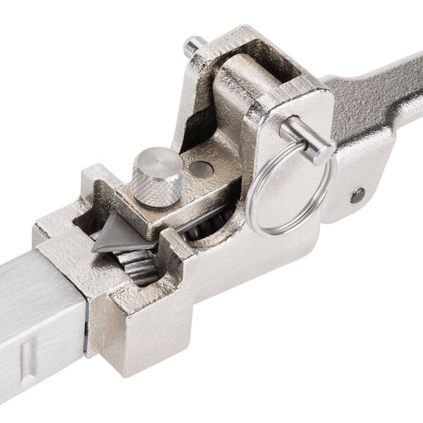 A stainless steel Edlund manual can opener with a metal clamp and handle.