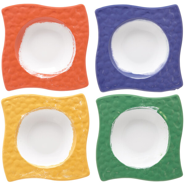 A set of GET Diamond Mardi Gras square melamine bowls in assorted colors with different designs.
