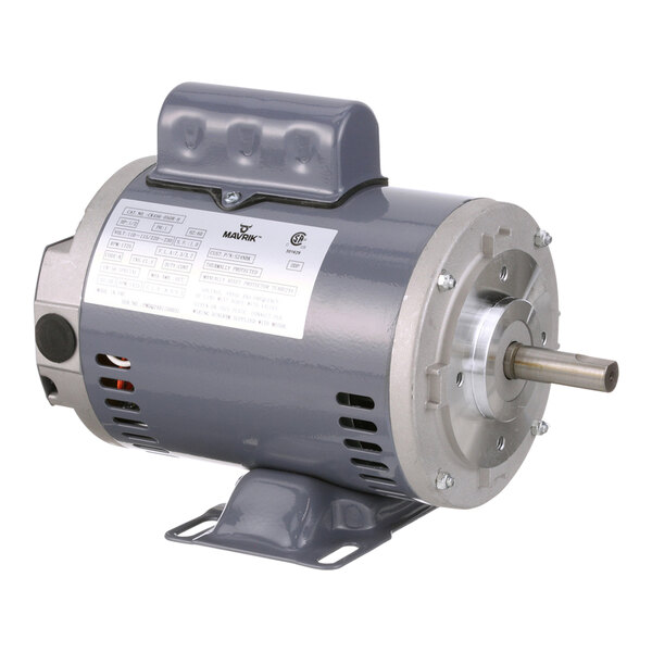 A grey electric motor with a round metal disc.