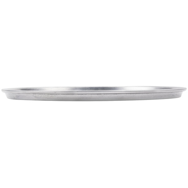a silver plate with a white background
