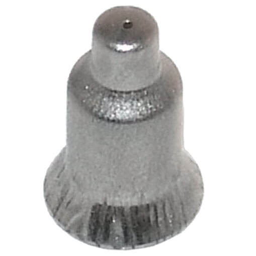 A close-up of a silver metal cap with a hole in it.