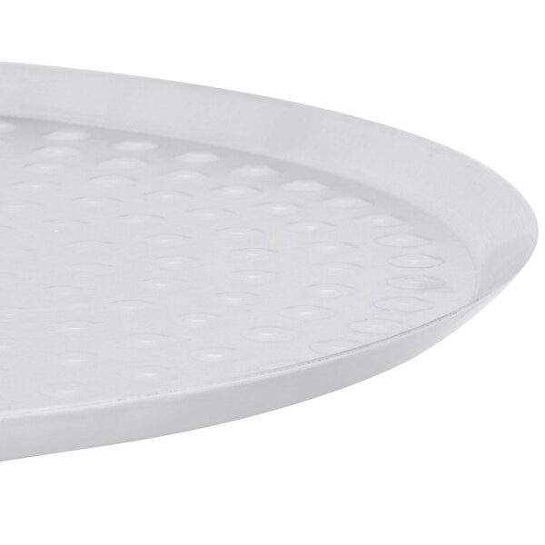 An American Metalcraft aluminum pizza pan with nibs.