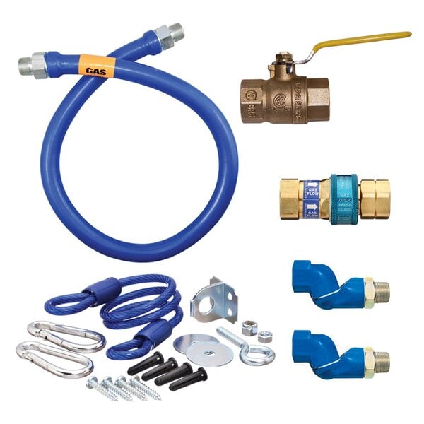 A blue Dormont gas connector kit with fittings and a restraining cable.