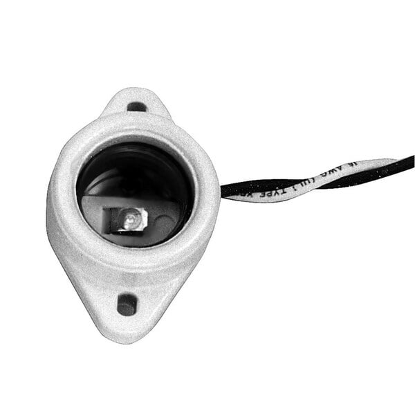 A white porcelain socket with wires attached.