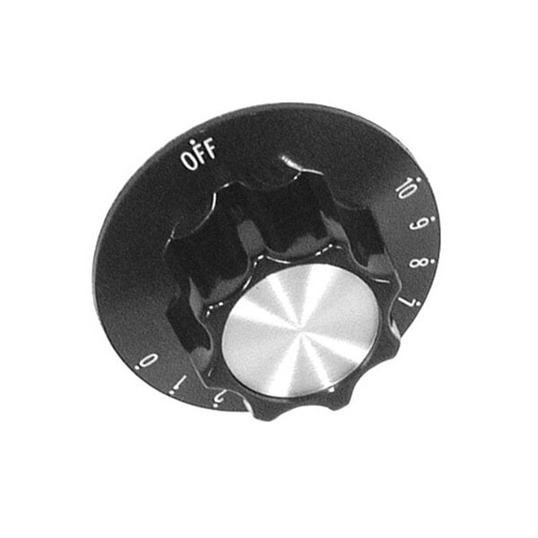 A black and silver circular dial with white text and a round knob with a white button on it.