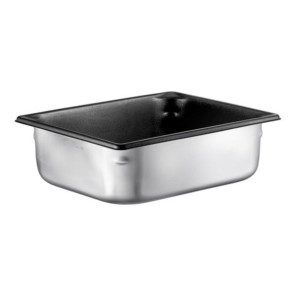 A Vollrath stainless steel pan with SteelCoat x3 Non-Stick coating.