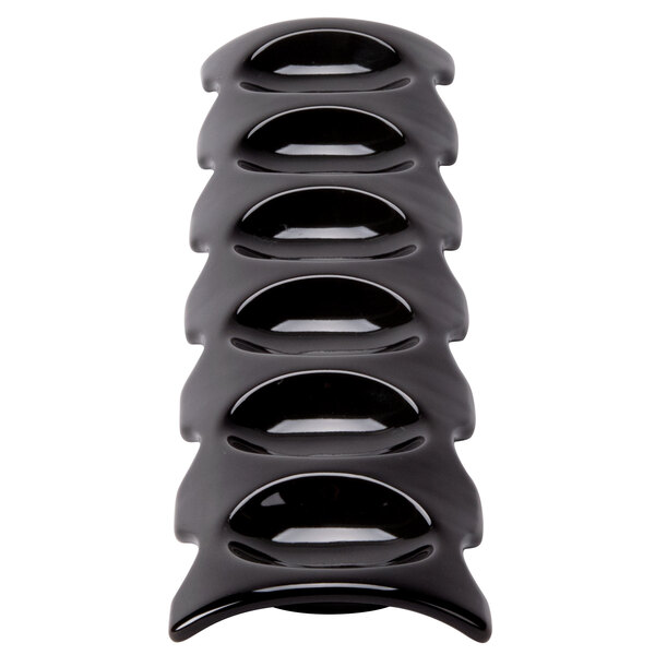 A black plastic holder with five holes for CAC Bright White Porcelain Spoons.