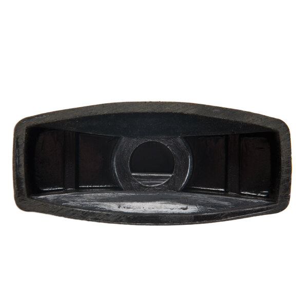 A close-up of a black 2 1/8" top burner valve handle with a hole in it.