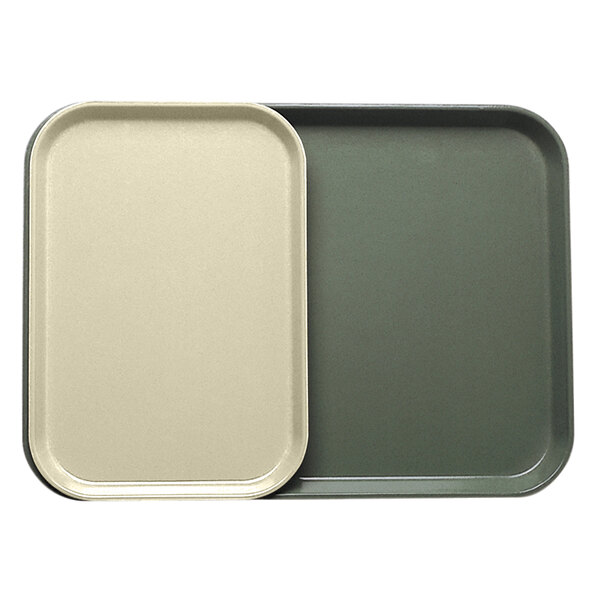 A close-up of a yellow rectangular Cambro tray insert.