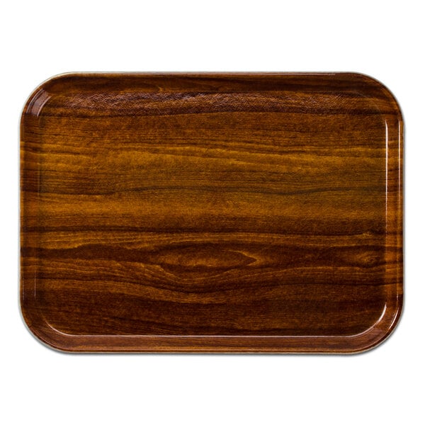 A rectangular Burma Teak wood tray with a dark wood finish.