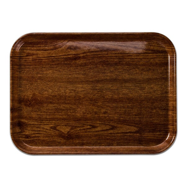 A rectangular Cambro Country Oak fiberglass tray with a dark wood finish.